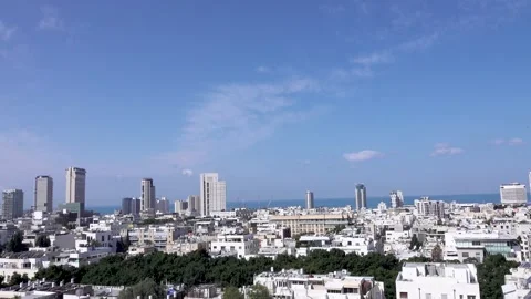 Tel aviv, Fast moving clouds, Tel Aviv buildings Stockbeeldmateriaal 196973724