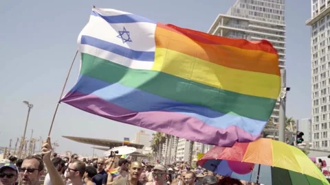 Tel Aviv, Israel - August 12, 2018: Crowd Marching at Gay Parade waving a LGBT Stock Footage