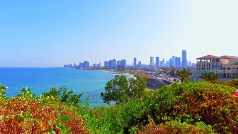 Tel Aviv Mediterranean sea beach with city skyline Stock Footage 73607094