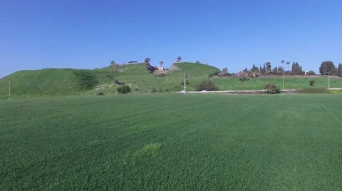 Tel Megiddo - Agriculture fields and ancient city (Israel aerial footage) Video stock 67580705
