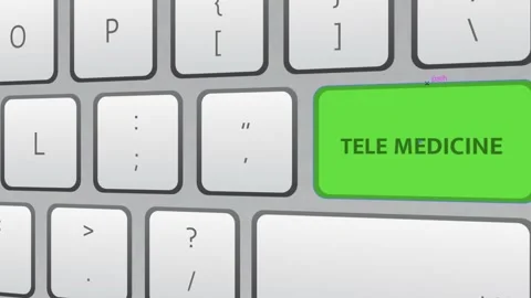 Tele Medicine green key button being clicked on white keyboard. Video stock 221460146