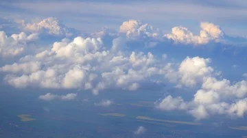 Tele view above the clouds from airplane Stock Footage 86091012