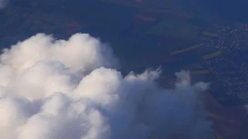 Tele view above the clouds from airplane Stock Footage 86096501