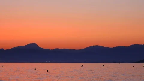 Tele view of Airplane is passing by in sunset at El Arenal, Mallorca, Spain Stock Footage 86165967