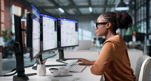 Telecom Engineer Studies Fiber Optic Network Routes Using Digital Mapping Sof Stock Photos