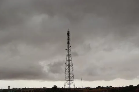 Telecom tower in cloudy weather Foto stock
