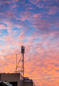 Telecom tower with  golden cloud Stock Photos