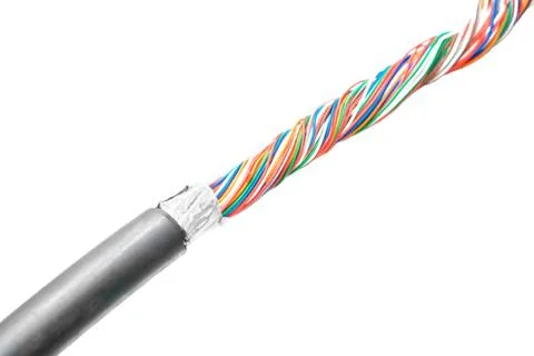 Telecommunication concept. Damaged insulation of stranded main wire. Multicol Stock Photos