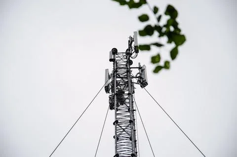 Telecommunication engineer working on high tower,Risk work of high work,Techn Stock Photos