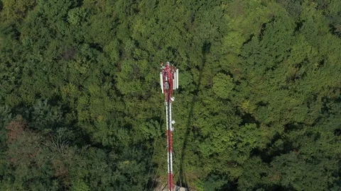 Telecommunication network repeater and base transceiver station 4K drone Stock Footage 115649428