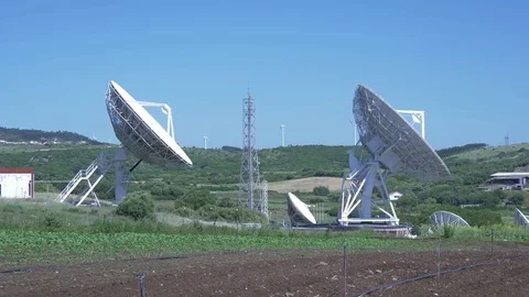 Telecommunication parabolic dish antenna complex 4k Stock Footage 76032355