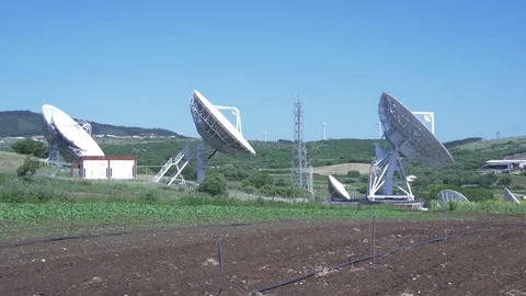 Telecommunication parabolic dish antenna complex 4k Video stock 76032410