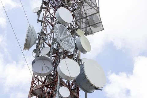 Telecommunication tower antennas providing global wireless connectivity on .. Stock Photos