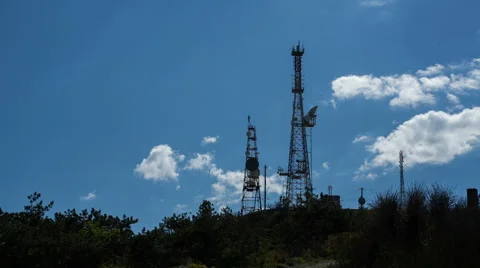 Telecommunication tower on the background of clouds Stock Footage 50367428