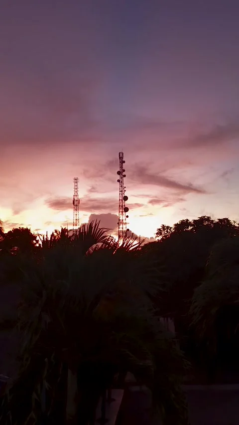 Telecommunication tower, background of the sunset sky Video stock 309870998