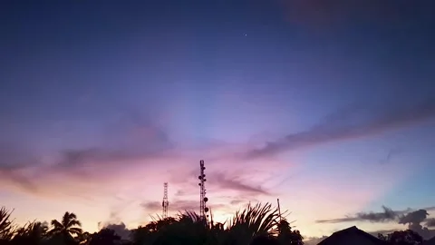 Telecommunication tower, background of the sunset sky Stock Footage 309870999
