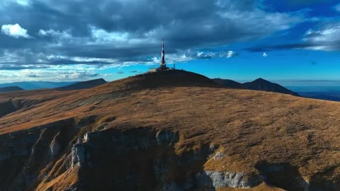 Telecommunication Tower on Bucegi Mountain Peak from Drone. Slow Motion. Stock Footage 286374404