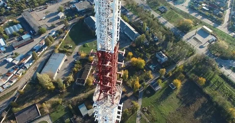 Telecommunication tower with cellular antennas in a residential area of the city Stock Footage