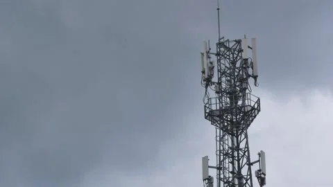 Telecommunication tower with clouds sky. timelapse Stock Footage 140451916