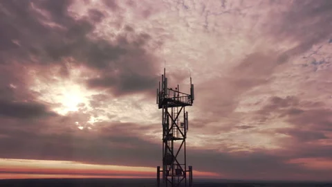 Telecommunication tower construction with cellular satellite antennae dishes Stock Footage 159767776