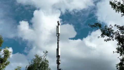 Telecommunication tower with moving clouds in the background 動画素材 326242123
