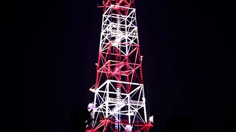 Telecommunication tower at night Stock Footage