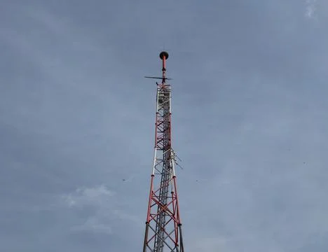 Telecommunication tower overview. Network infrastructure with antennas agai.. Stock Photos