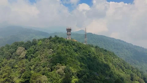 Telecommunication Tower on Top of Lush Forest Mountain Ridge Vídeos de archivo 340633706