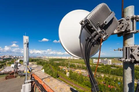 Telecommunication tower with wireless communications systems are including Stock Photos