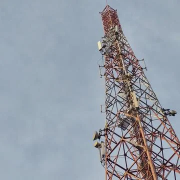 Telecommunication towers as infrastructure for wireless communication Stock Photos