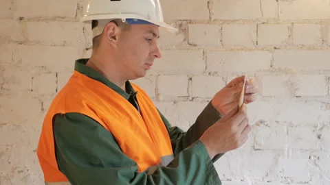 Telecommunications engineer works with data cable Stock Footage 89226260