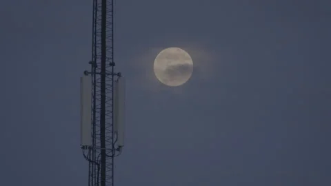 Telecommunications mast, full moon clouds 動画素材 130595370