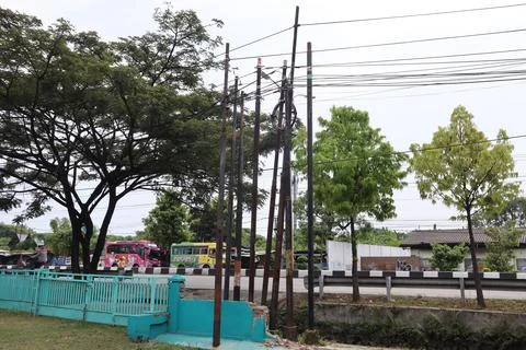 Telecommunications poles stand in disarray Stock Photos
