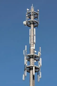 Telecommunications tower with antennas. Stock Photos