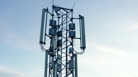 Telecommunications tower carrying broadcasting antennas for 5G cellular networks Stock Footage