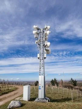 A telecommunications tower equipped with multiple antennas Stock Photos