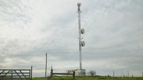 Telecommunications Tower with Microwave Dish Antennas and Lattice Mast Stock Footage 328962533