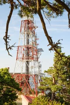 Telecommunications tower at the top of the mountain. Stock Photos
