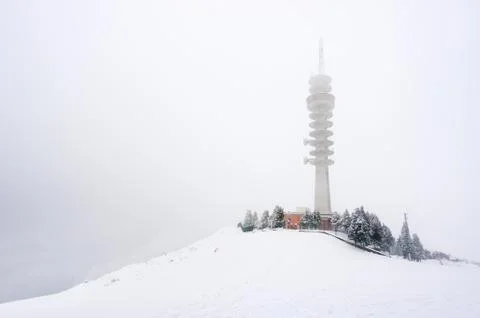 Telecommunications tower in winter Stock Photos