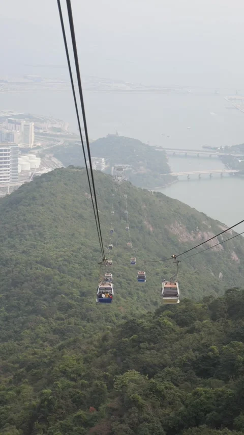 Teleferic Ride Through the Mountains Vertical 4K Scenic Video Stock Footage 295792207