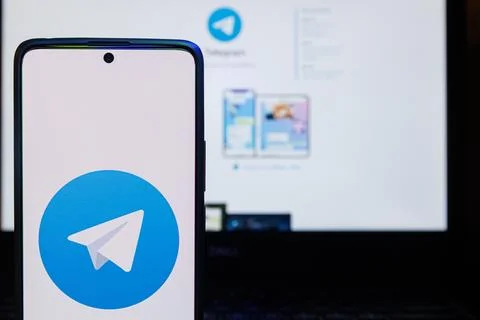 Telegram app logo on smartphone screen. Telegram messenger, free speech Stock Photos