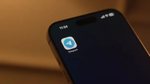 Telegram App Opening on Smartphone Screen 動画素材 343415368
