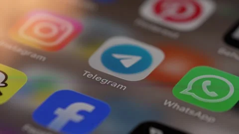 Telegram App Opening on Smartphone Screen 動画素材 343415401