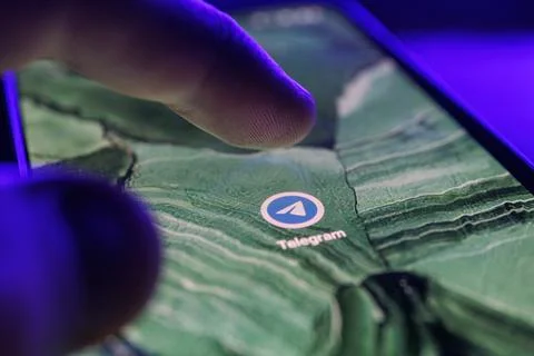 Telegram app on smartphone screen. Close up shot of Telegram app Stock Photos