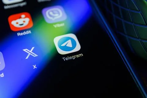Telegram app on smartphone screen. Telegram messenger, free speech, security Stock Photos