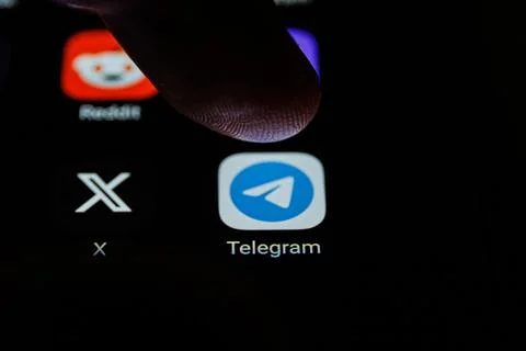Telegram app on smartphone screen. Telegram messenger, free speech, security Stock Photos