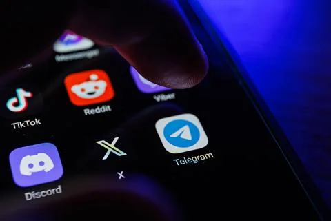 Telegram app on smartphone screen. Telegram messenger, free speech, security Stock Photos
