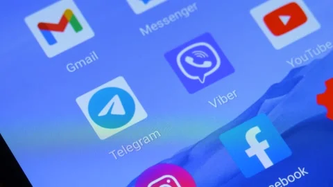 Telegram application on screen of smartphone. Messenger app icon 動画素材 146651274