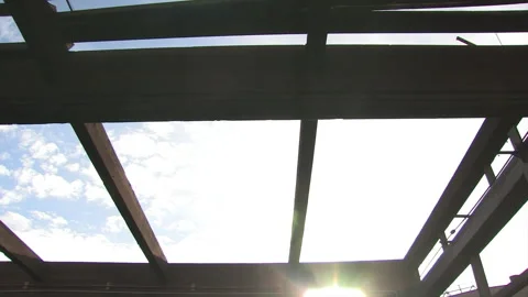 Telehandler Lifting Worker toward Wood Beams at Deconstruction Site in Bonner Stock Footage 134204418