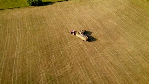Telehandler load collecting straw bales freight trailer of agricultural tractor Stock Footage 246046201